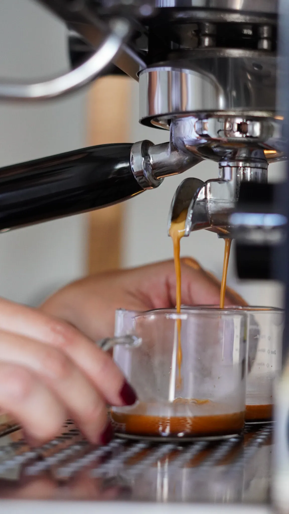 Pouring coffee into a cup